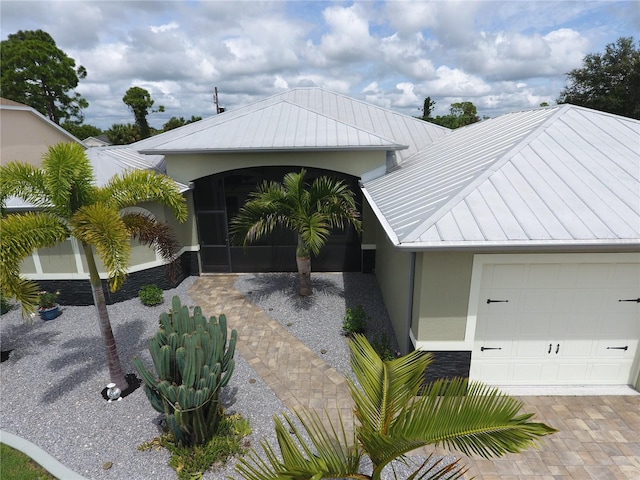 view of front of property with a garage