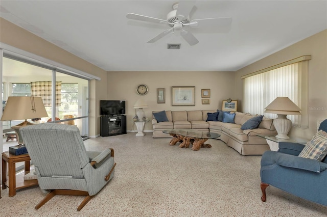 living room featuring ceiling fan