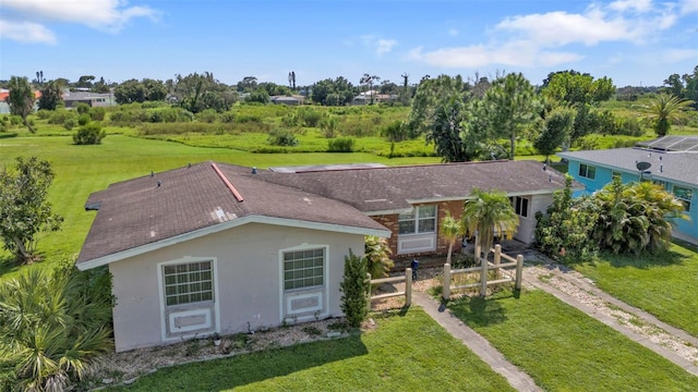 view of front of home with a front yard