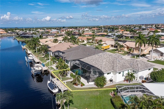 bird's eye view with a water view