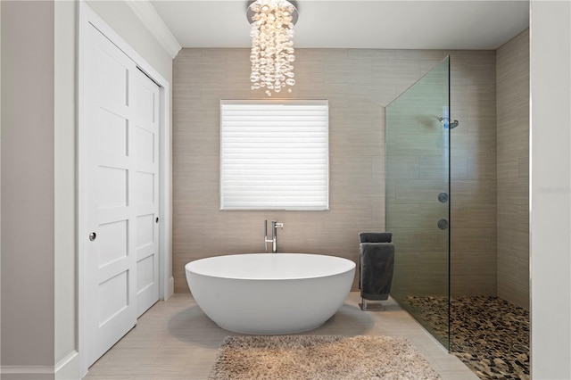 bathroom with plus walk in shower and tile patterned floors