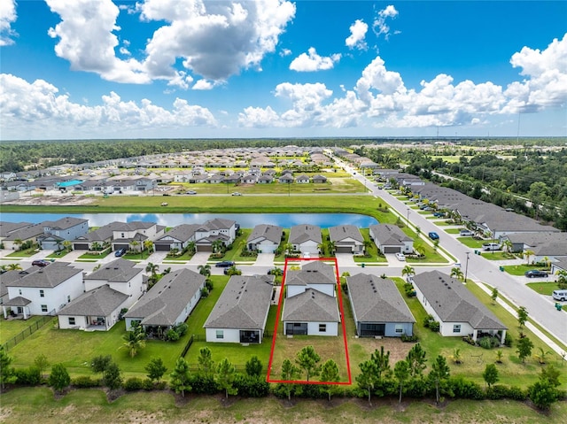 drone / aerial view featuring a water view