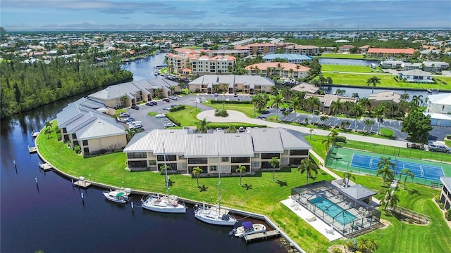 drone / aerial view with a water view