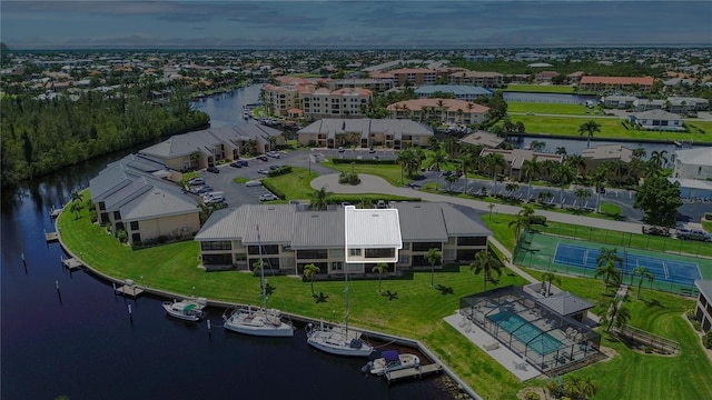 birds eye view of property featuring a water view