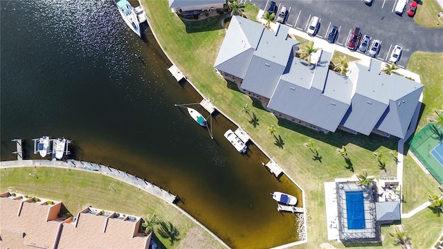 drone / aerial view featuring a water view