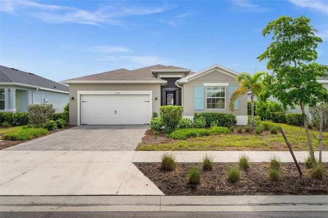 ranch-style home with a garage