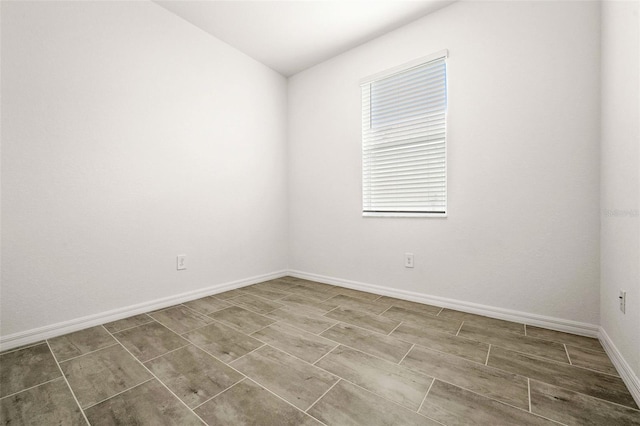 empty room featuring wood-type flooring