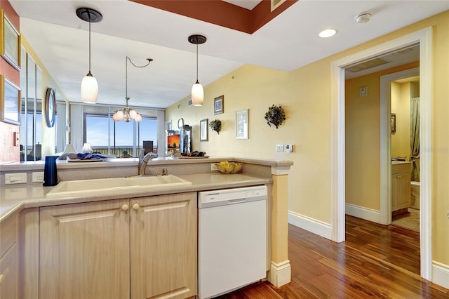 kitchen with dark hardwood / wood-style floors, hanging light fixtures, an inviting chandelier, light brown cabinets, and white dishwasher