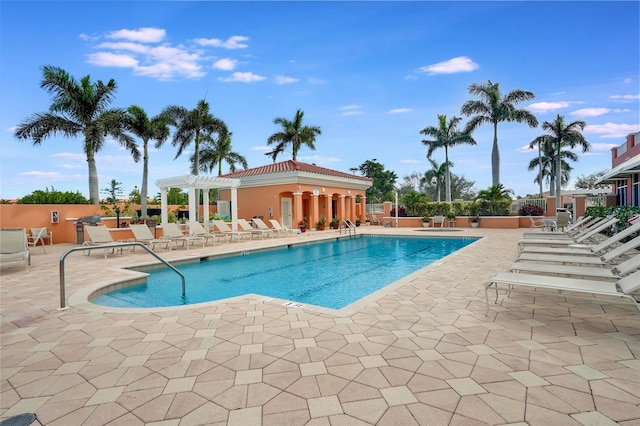 view of swimming pool featuring a patio