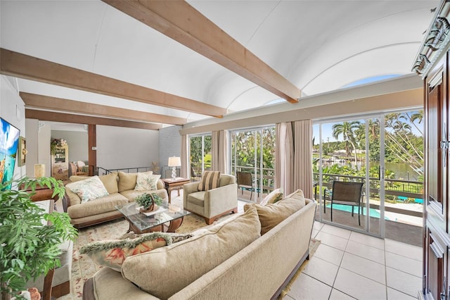 tiled living room featuring beam ceiling