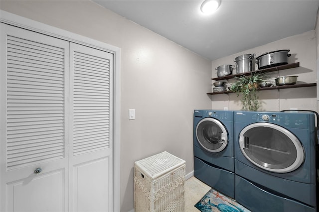 laundry room with independent washer and dryer