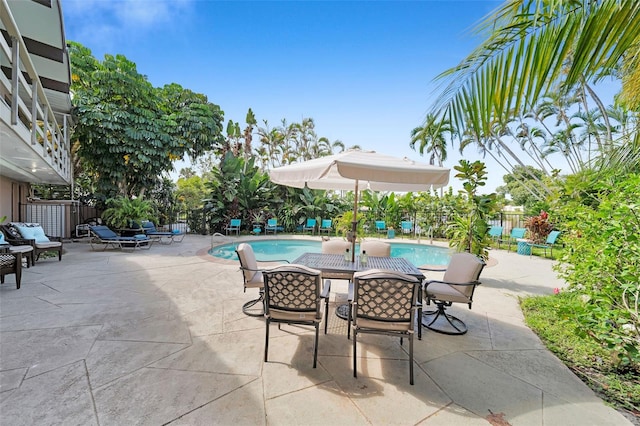 view of patio / terrace featuring a fenced in pool