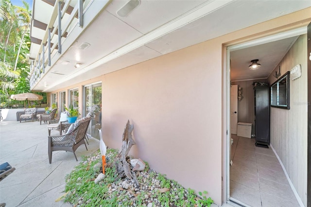 property entrance with a patio