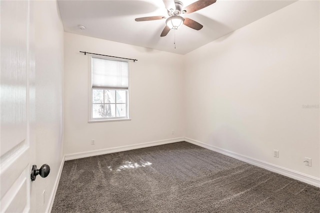 spare room with ceiling fan and carpet flooring