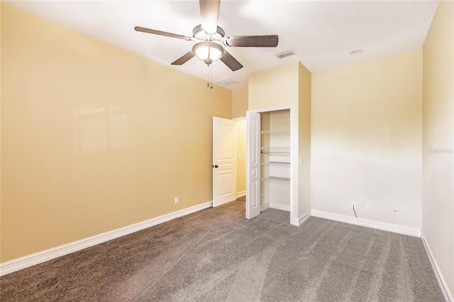 unfurnished bedroom with ceiling fan, a closet, and carpet