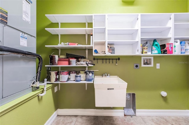 laundry area with washer hookup, sink, and electric dryer hookup