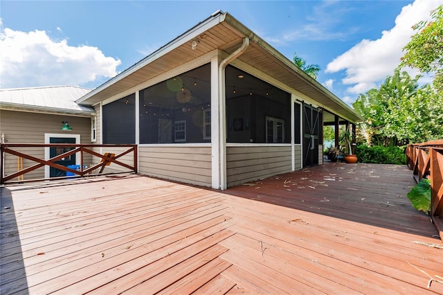 deck featuring a sunroom