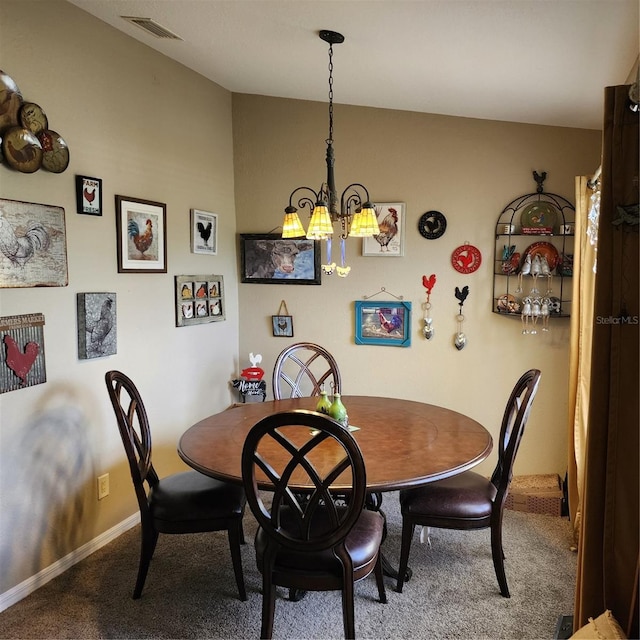 carpeted dining space with an inviting chandelier