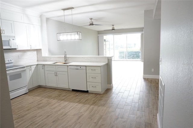 kitchen featuring white appliances, light hardwood / wood-style flooring, ceiling fan, hanging light fixtures, and white cabinets