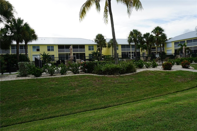 view of community with a yard