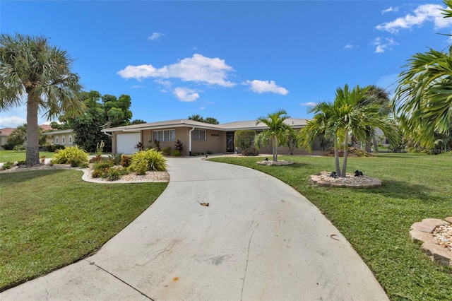 ranch-style home with a garage and a front yard