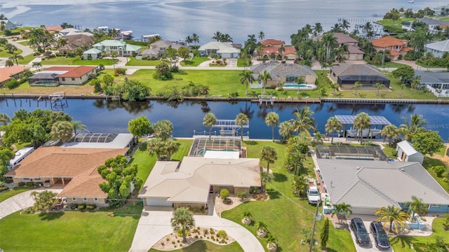 bird's eye view with a water view