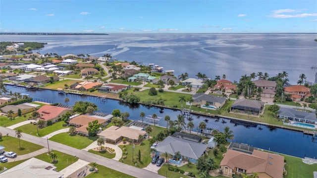 drone / aerial view featuring a water view