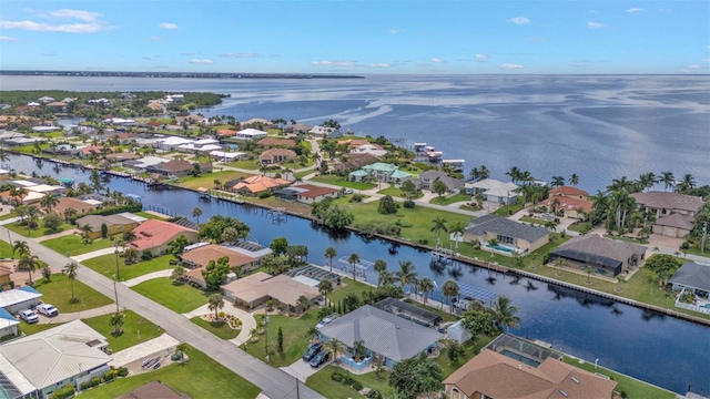 drone / aerial view with a water view