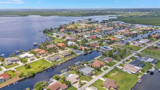 bird's eye view with a water view