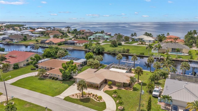 bird's eye view with a water view