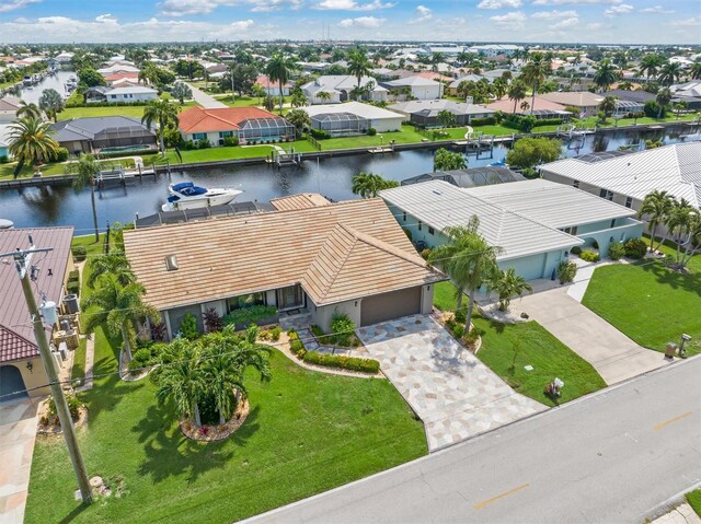 drone / aerial view with a water view