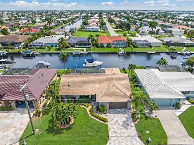 bird's eye view with a water view