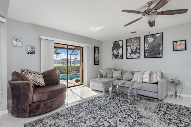 living room featuring ceiling fan