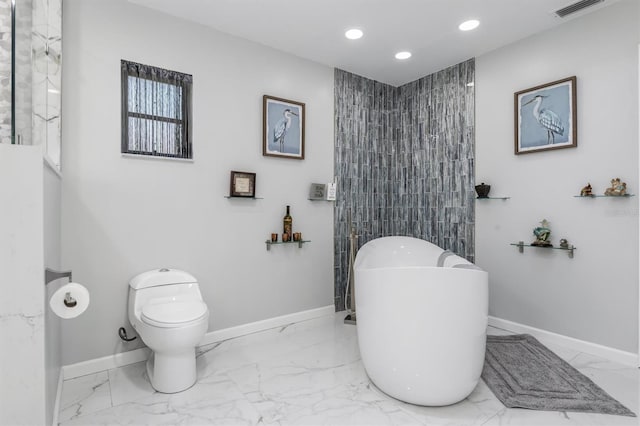 bathroom with a tub, tile walls, and toilet