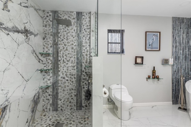 bathroom with tiled shower and toilet