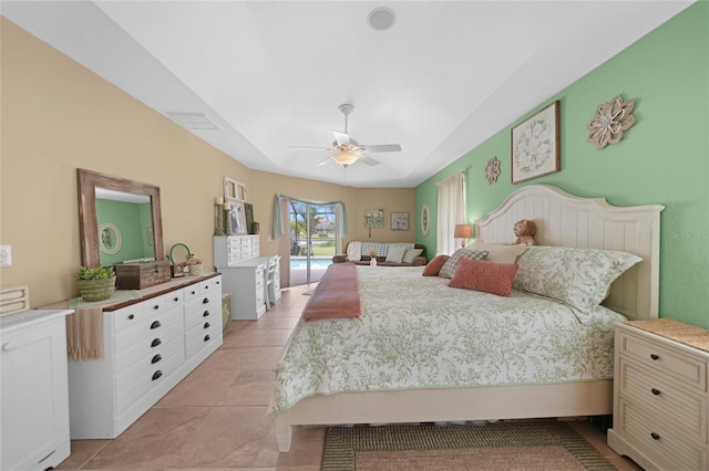 bedroom featuring ceiling fan and light tile patterned floors