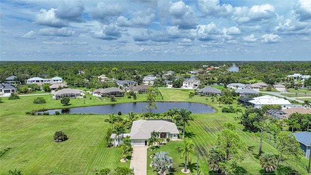 birds eye view of property featuring a residential view and a water view
