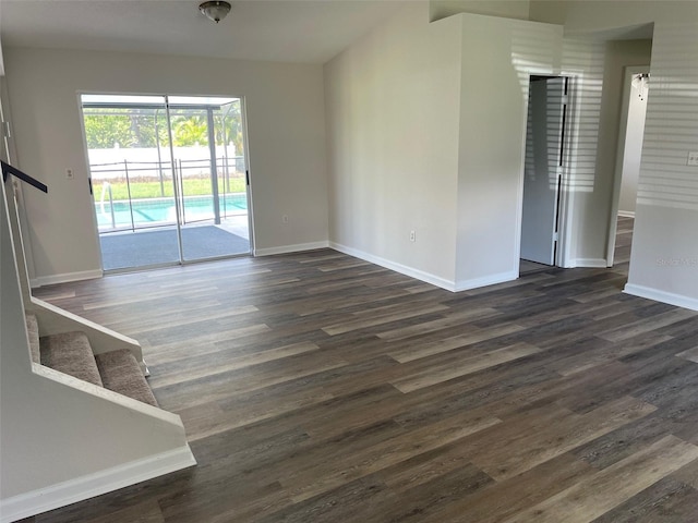 interior space with dark hardwood / wood-style floors