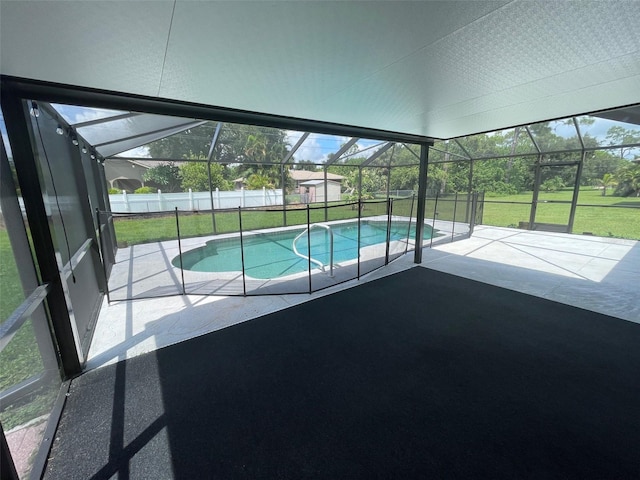 view of swimming pool with a patio and a lawn