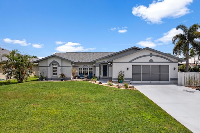 ranch-style home with a garage and a front lawn