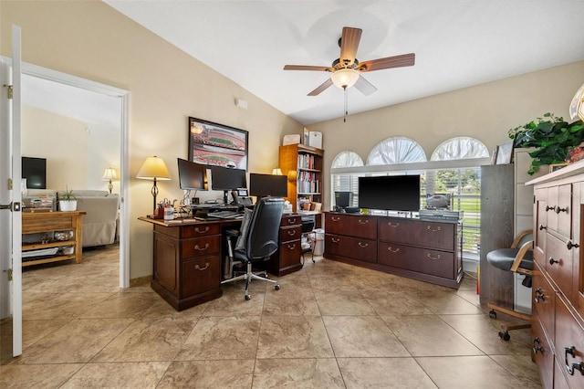 tiled office space with vaulted ceiling and ceiling fan