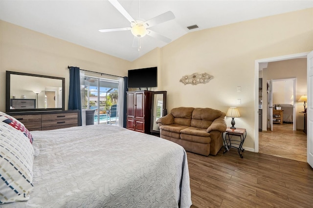 bedroom with access to outside, lofted ceiling, ceiling fan, and dark wood-type flooring