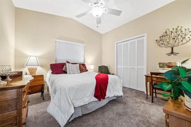 bedroom featuring lofted ceiling, carpet flooring, ceiling fan, and a closet