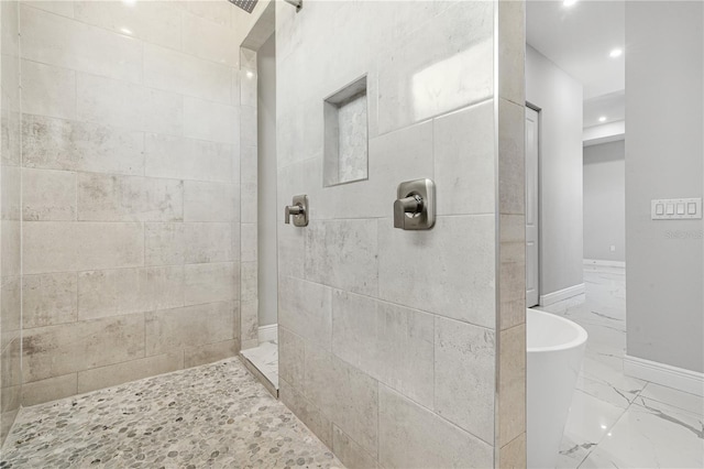 bathroom with separate shower and tub