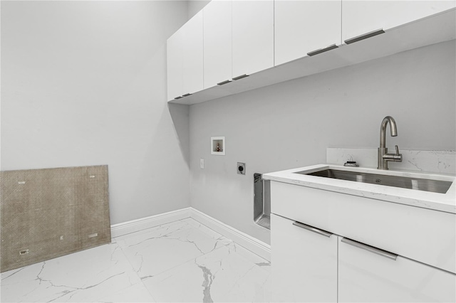 laundry room featuring cabinets, sink, electric dryer hookup, and washer hookup