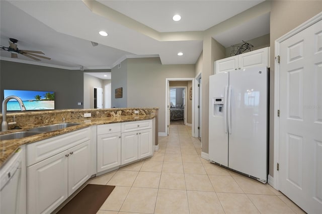 3959 San Rocco Ct Unit 911, Punta Gorda, FL 33950 - kitchen with white appliances, a sink, white cabinetry, light tile patterned floors, and recessed lighting