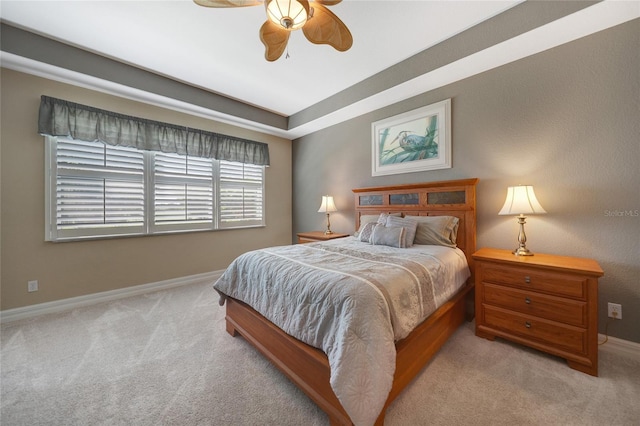 bedroom with light colored carpet and ceiling fan