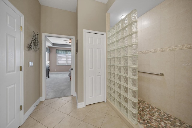 3959 San Rocco Ct Unit 911, Punta Gorda, FL 33950 - full bath featuring a walk in shower, tile patterned floors, baseboards, and ceiling fan