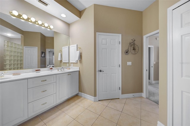 bathroom featuring vanity and tile patterned flooring