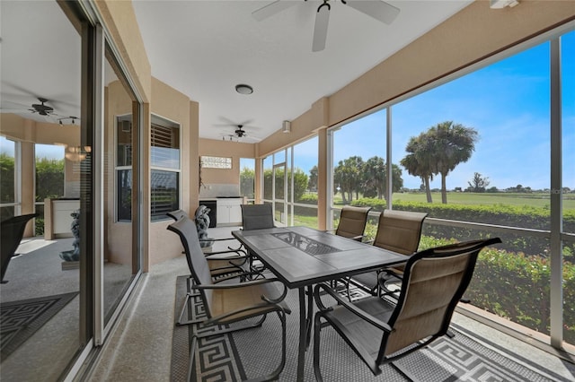 3959 San Rocco Ct Unit 911, Punta Gorda, FL 33950 - sunroom featuring a ceiling fan and outdoor dining area